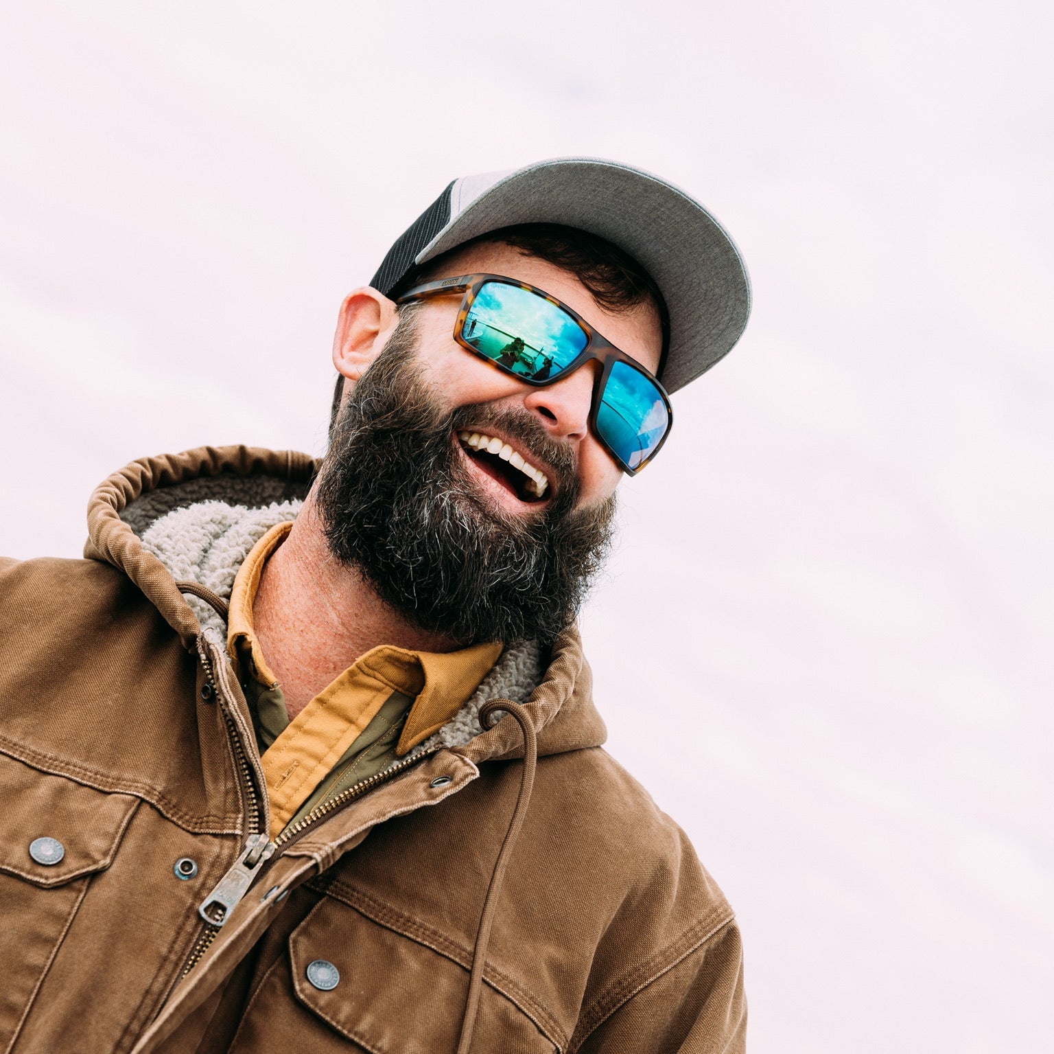 fisherman wearing polarized fishing sunglasses
